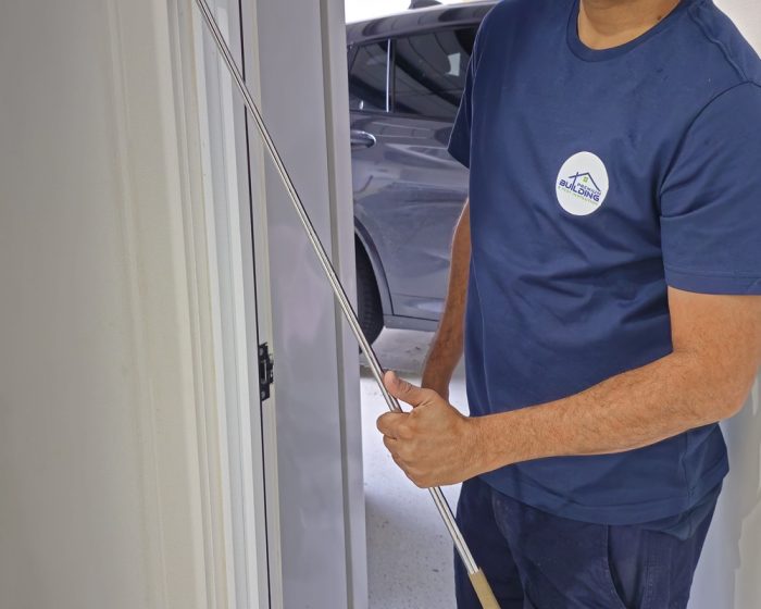 Certified building inspector performing a property inspection in Melbourne