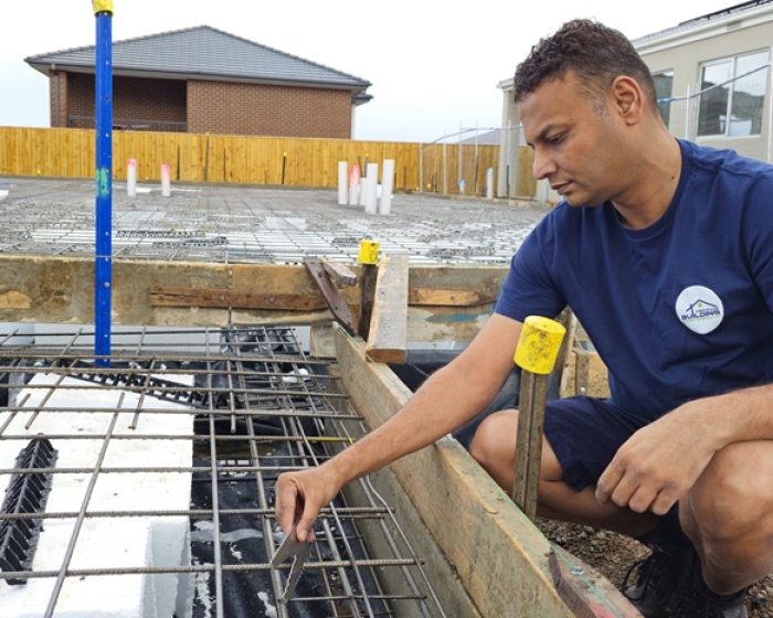 Certified building inspector performing a property inspection in Melbourne
