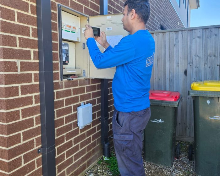 Builder Warranty Inspection 2 Certified building inspector conducting a property inspection in Melbourne