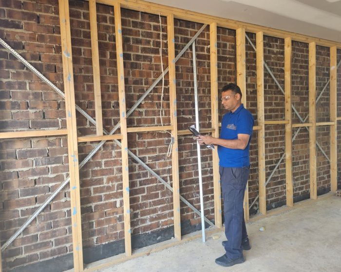 Builder Warranty Inspection 4 Certified building inspector performing a property inspection in Melbourne