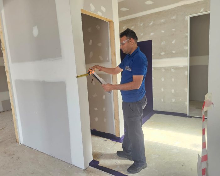 Certified building inspector performing a property inspection in Melbourne