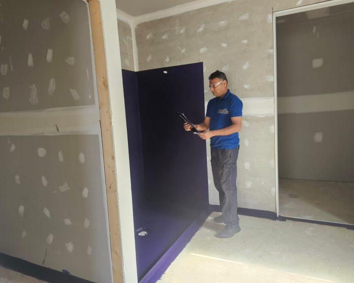 Certified building inspector performing a property inspection in Melbourne