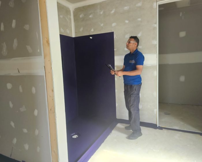 Certified building inspector performing a property inspection in Melbourne