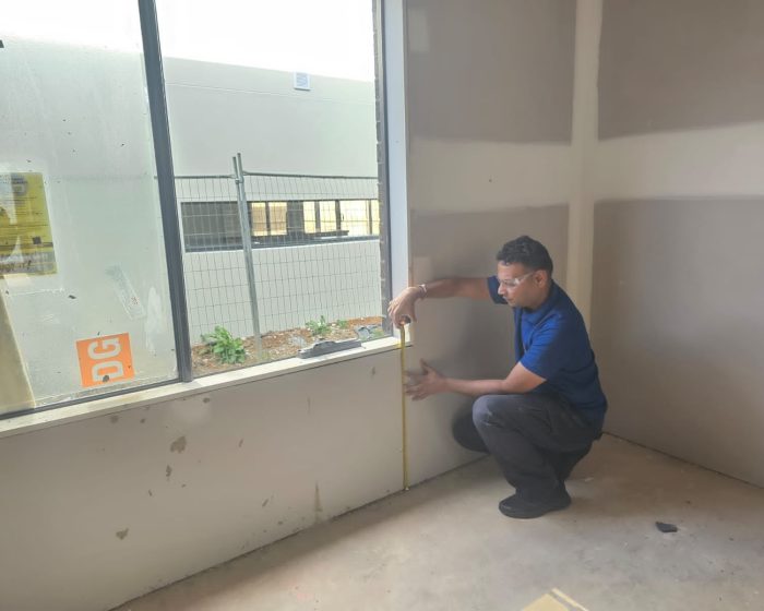 Certified building inspector performing a property inspection in Melbourne