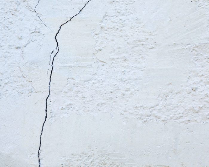 Rising Damp Inspection 2 Wall with cracked paint texture during property inspection